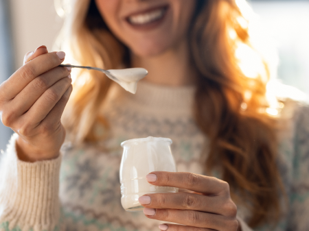 Agricultural harvesting at the last light of day, aerial view