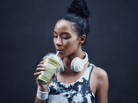 Agricultural harvesting at the last light of day, aerial view