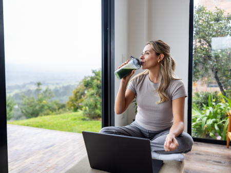 Agricultural harvesting at the last light of day, aerial view