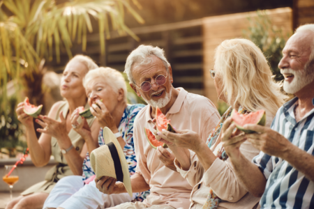 Agricultural harvesting at the last light of day, aerial view