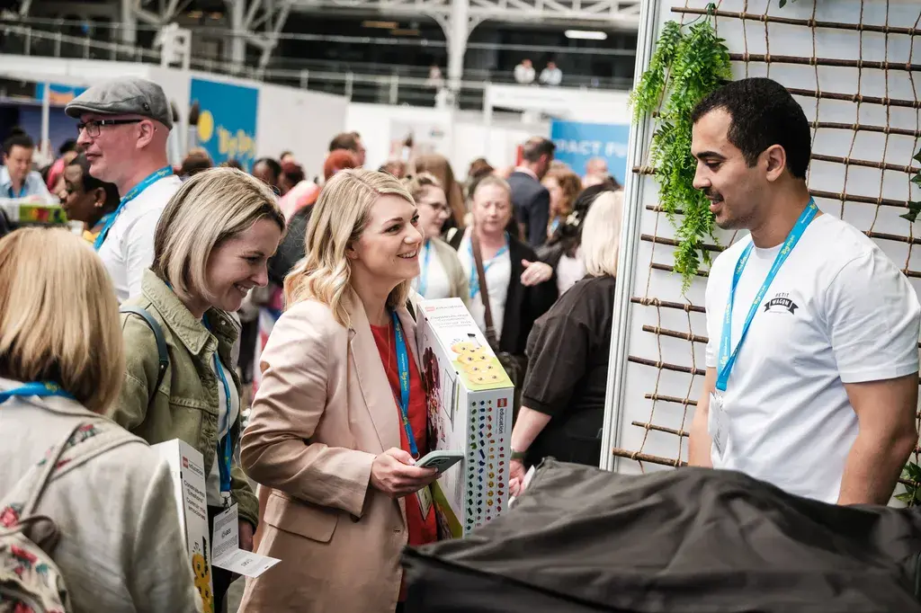 Visitors meeting exhibitors at Nursery World’s Big Day Out