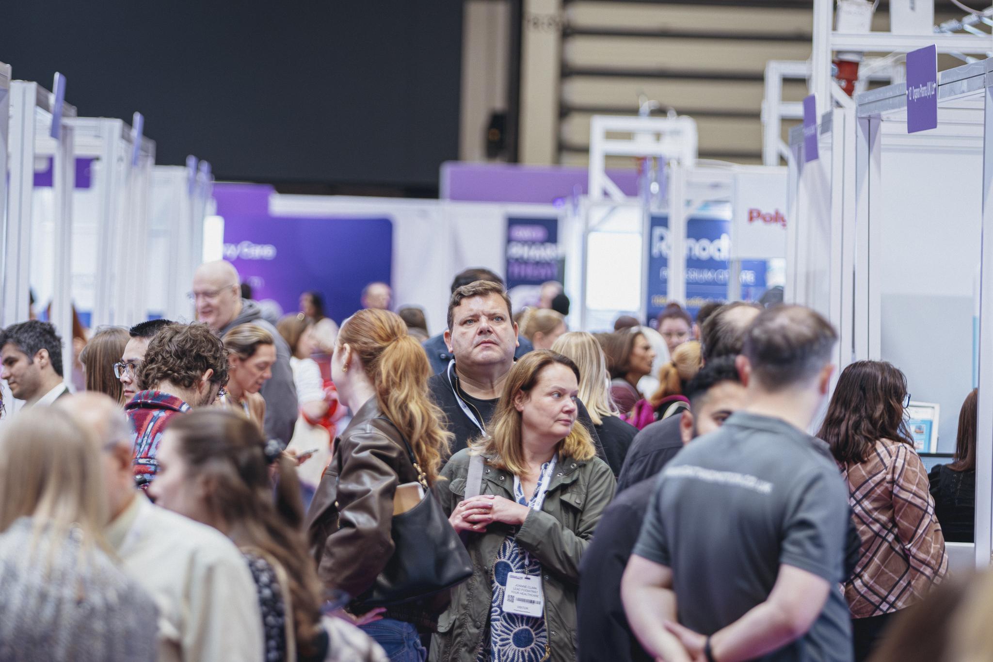 Healthcare professionals exploring the exhibition floor