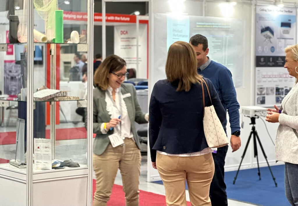 Exhibitors and visitors meeting on the show floor