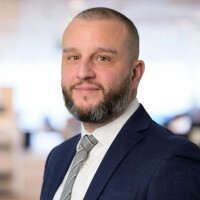 Buster Tolfree, United Trust Bank Ltd